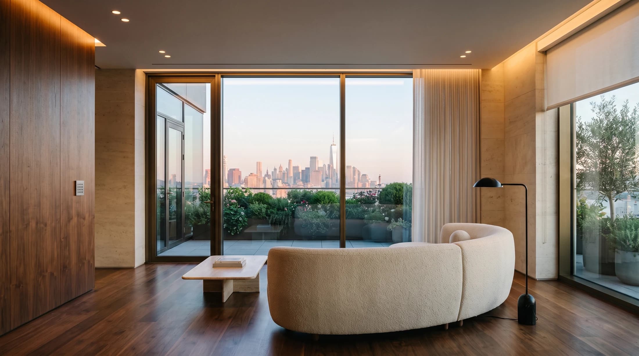 Architectural concept of a warm contemporary home with discreet integrated lighting, shades, and sound